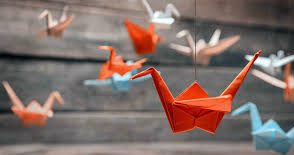 اوریگامی-پرنده درحال پرواز
